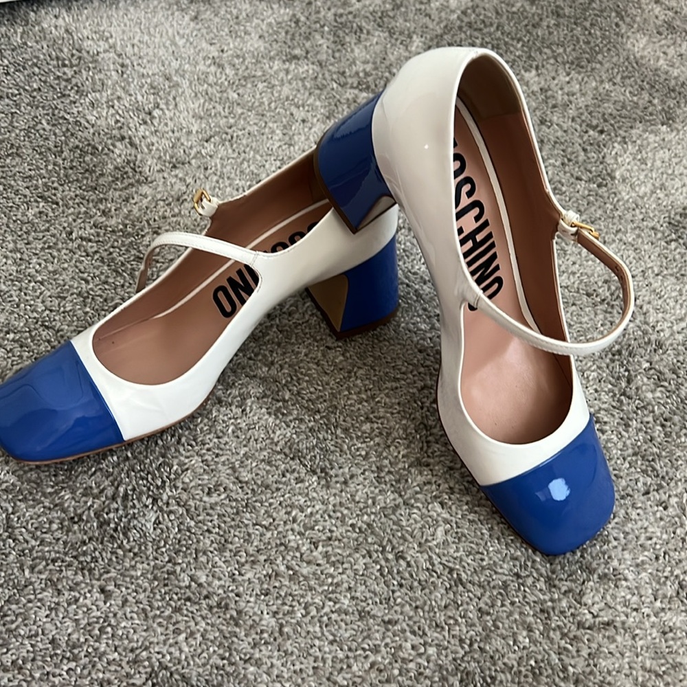 Very spicy Moschino White and Blue Heeled Shoes bought for a special occasion.